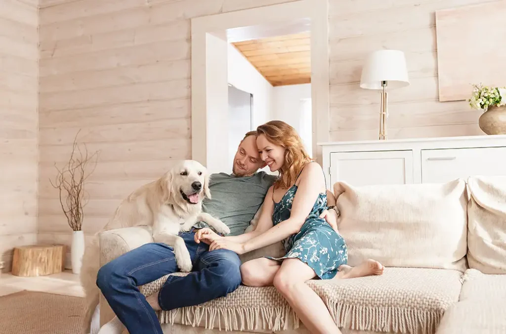 man and woman with their dog enjoying the comfort of their home collinsville illinois