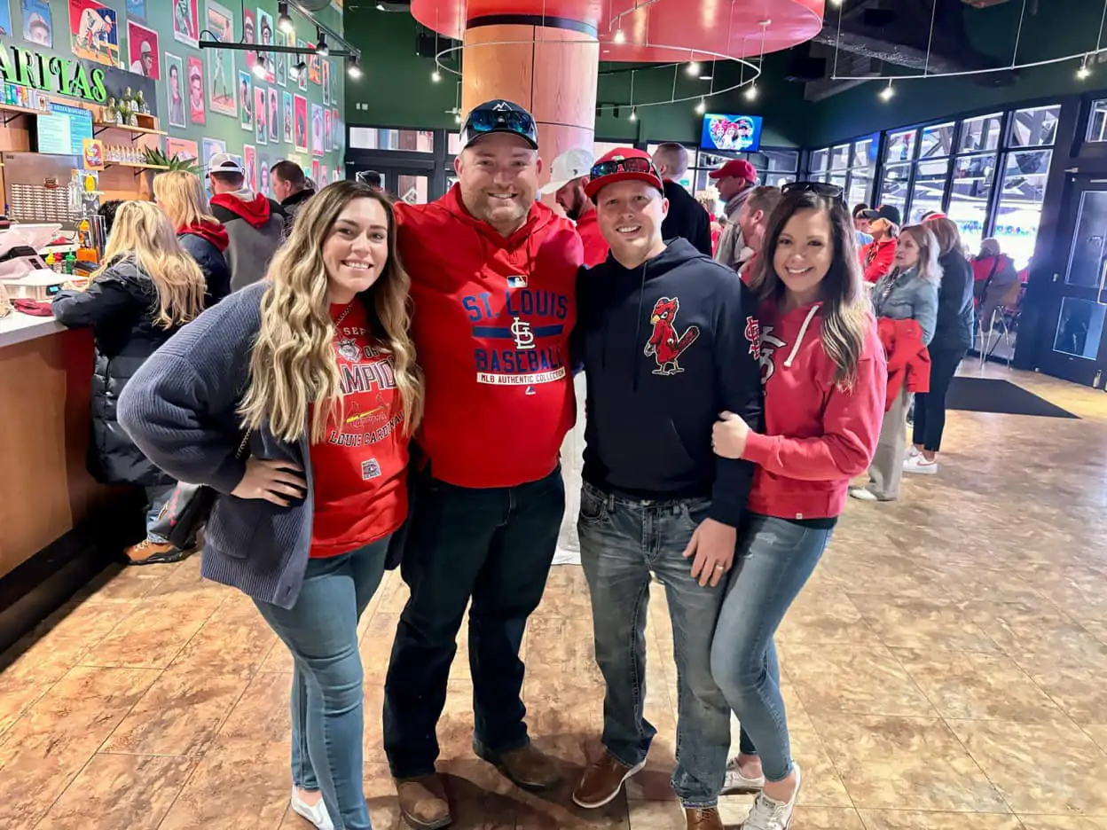 polar aire owner and plumbing division head and family enjoying a baseball game