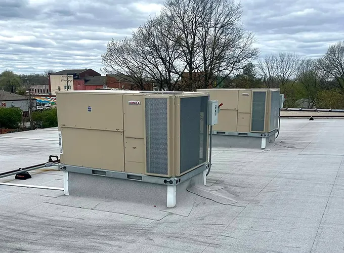 Commercial heating and cooling units on the rooftop of a commercial building in Collinsville IL
