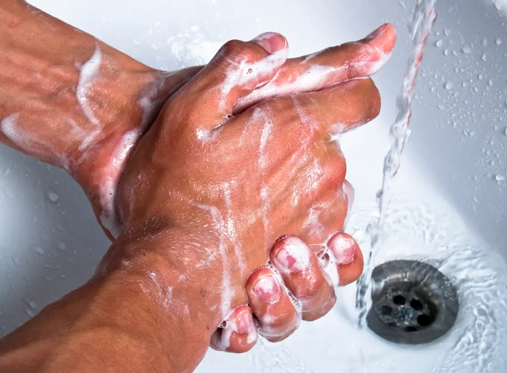 washing hands in sink with a consistently draining sink collinsville il