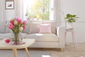 POLAR – A living room with a vase of blooming pink and white tulips, showcasing the effects of spring dehumidification.