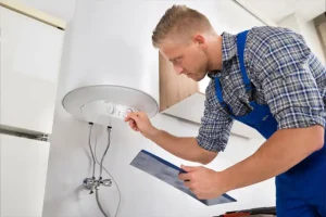 Polar—A professional technician examines a water heater in a home in Troy, IL.
